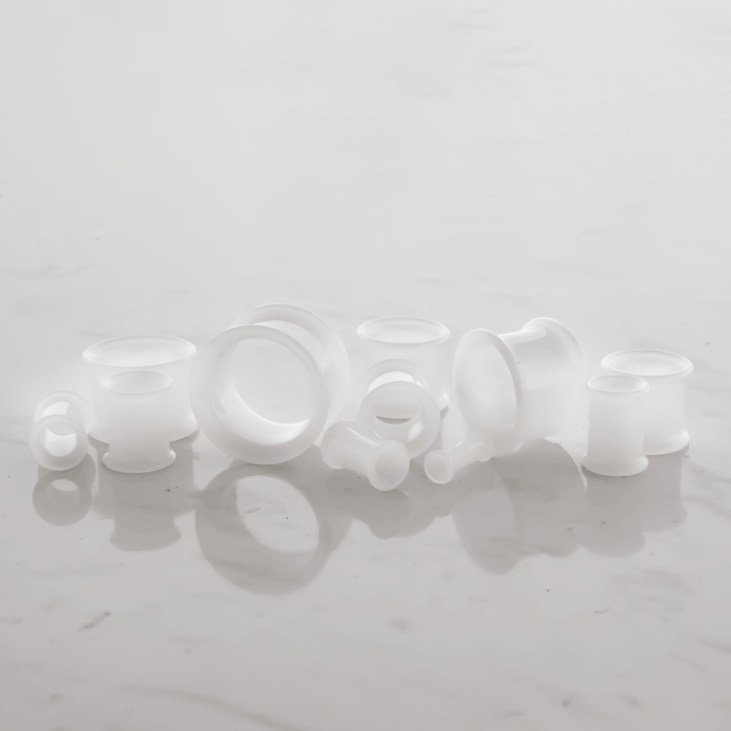 Translucent White Glass Double Flare Tunnels – 8G–5/8" | 5/16" Wearable