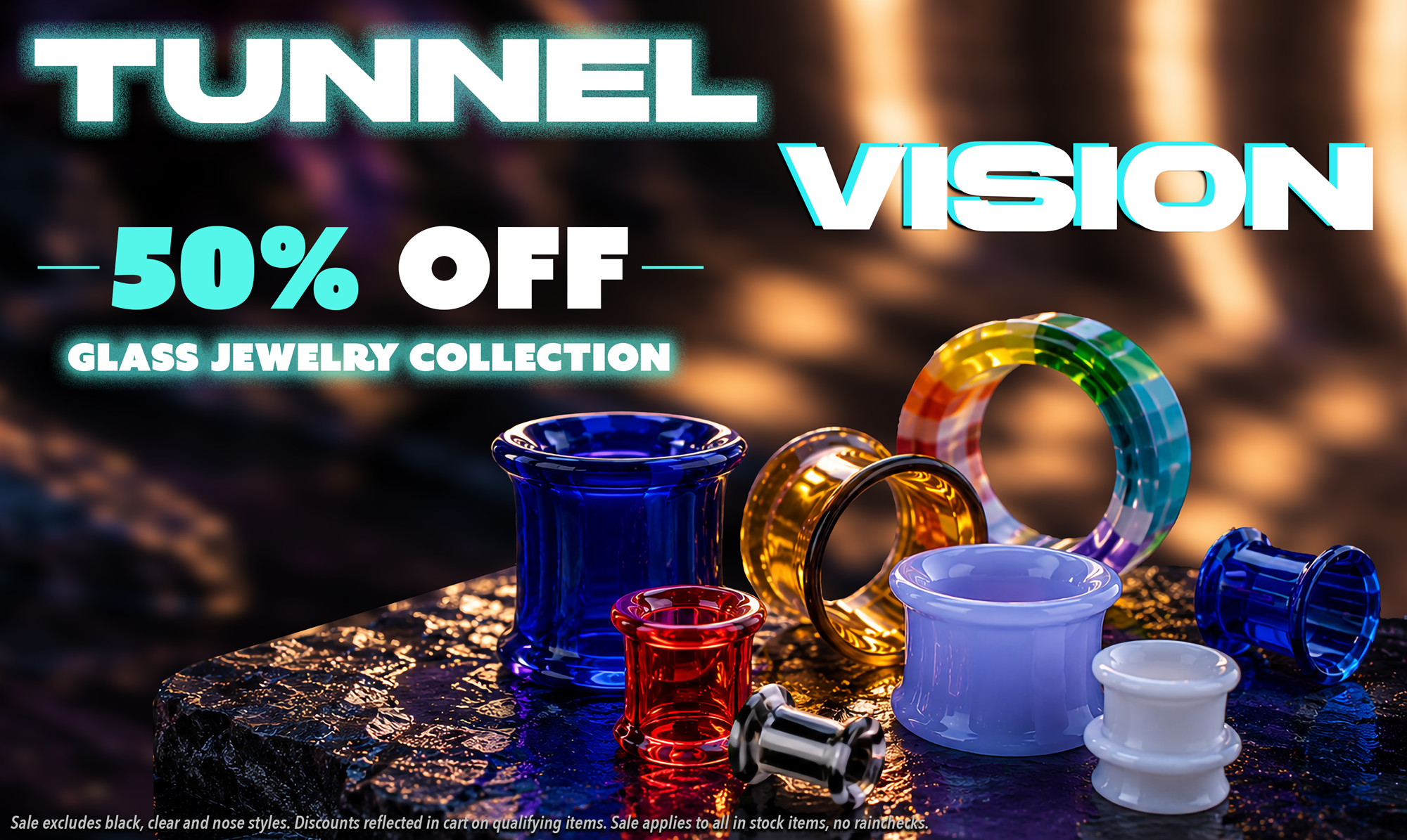 glass sale announcement- glass tunnel jewelry in a rock with dark mood lighting